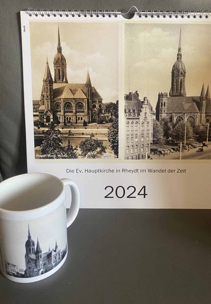 Foto-Jahreskalender 2024 und Motiv-Tasse der ev. Hauptkirche in Rheydt unter dem Motto: im Wandel der Zeit.
